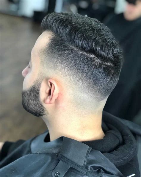 The bald fade is a fade haircut that features longer hair on top and short back and sides, usually shaved down to the skin (bald). 14 Cleanest High Taper Fade Haircuts for Men - Latest Haircuts for Men
