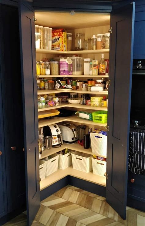 An Open Pantry Filled With Lots Of Food