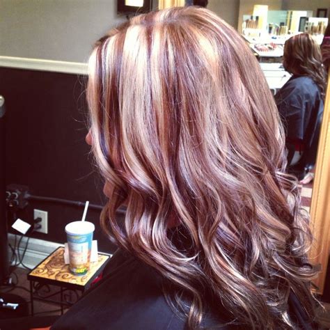 There are light and dark tones of red in this gorgeous style. Full of dimension hair. Highlights and lowlights. | My ...