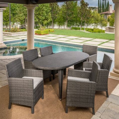 Crete Outdoor 7 Piece Wicker Oval Dining Set With Water Resistant