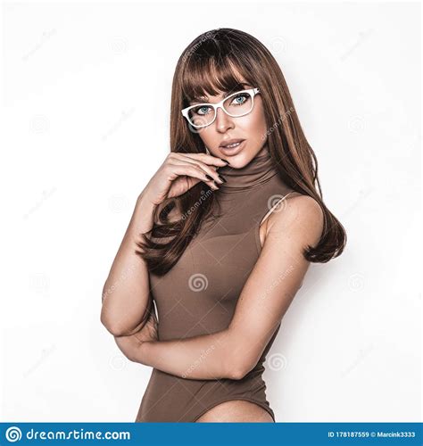 Pretty Girl With Long And Shiny Hair Wearing Glasses Beautiful Model With A Bronze Hair And
