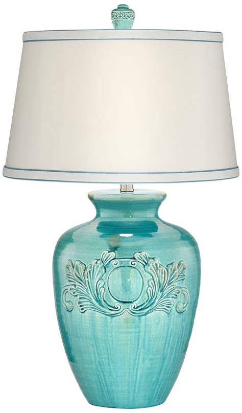 Place this charming, striking lamp on an end table or nightstand for a splash of. Celia Teal Blue Ceramic Table Lamp - #9T585 | Lamps Plus ...