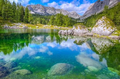 Slovenia Lakes Stones Rocks Mountains Nature Landscapes Trees