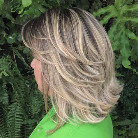 20 Best Ideas Of Feathered Cut Blonde Hairstyles With Middle Part