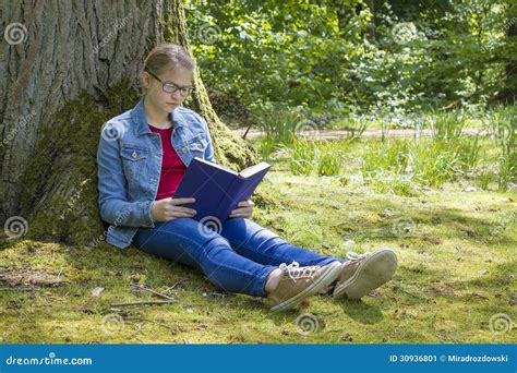 Young Girl Reading Book In Park Stock Image Image Of Learning