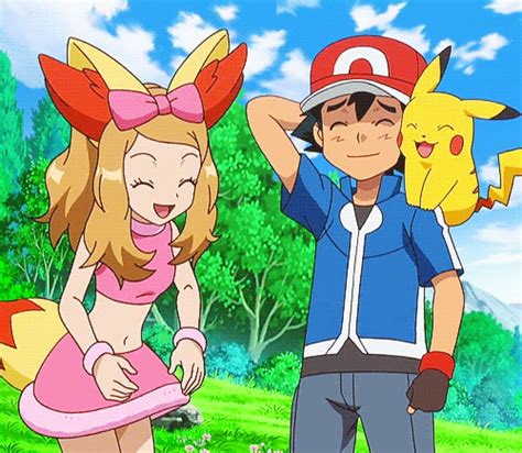 Two People Standing Next To Each Other With Pokemon On Their Backs And One Person Wearing A Pink
