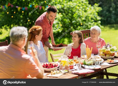 However, those in charge of cooking might find that the term conjures up feelings of stress, coming up with easy dinner ideas that are home runs night after night. happy family having dinner or summer garden party — Stock ...