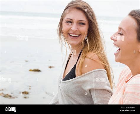 Two Woman Walking On A Beach Hi Res Stock Photography And Images Alamy