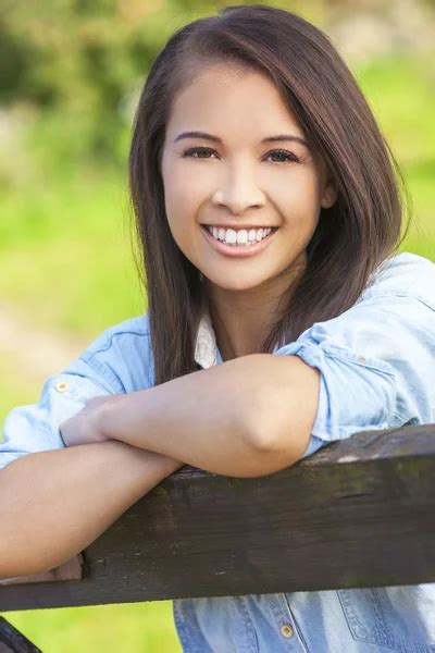 Beautiful Asian Eurasian Girl Smiling With Perfect Teeth Stock Photo By