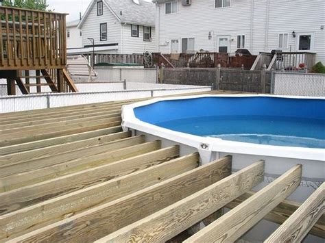 Above ground pools with decks will create a pleasant situation in the sun place for your loved ones and friends. Deck around a pool | Swimming pool decks, Pool deck plans ...