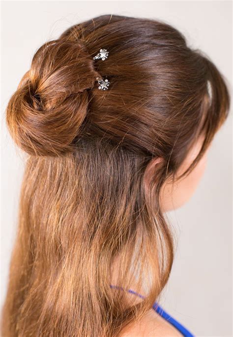 Bun Hairstyle Embellished By A Delicate Pair Of Stars Bobby Pins