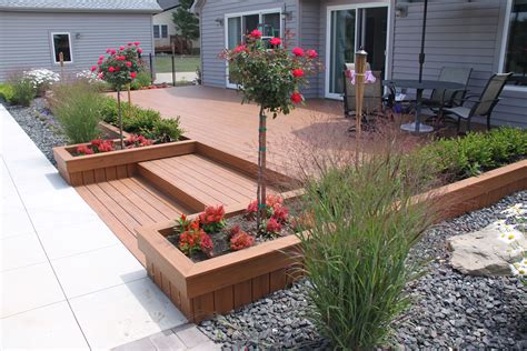 Composite Deck With Built In Landscaping Sloped Garden Deck Garden