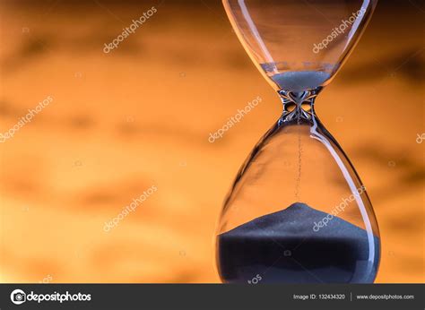 Sand Running Through An Hourglass Stock Photo By ©serggn 132434320