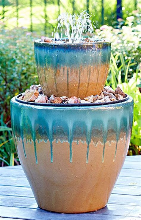 It then cascades down into the middle barrel and then. 18 Crystal Clear and Calming DIY Water Feature Ideas for ...