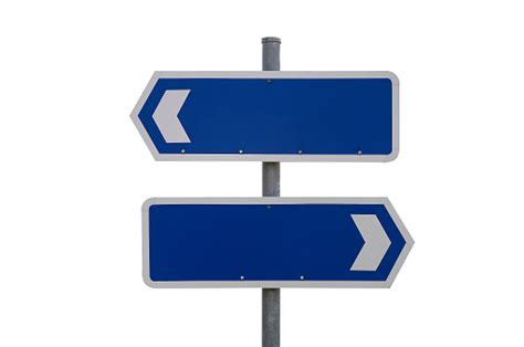 Blank Blue And White Signs Pointing In Different Directions Stock Photo
