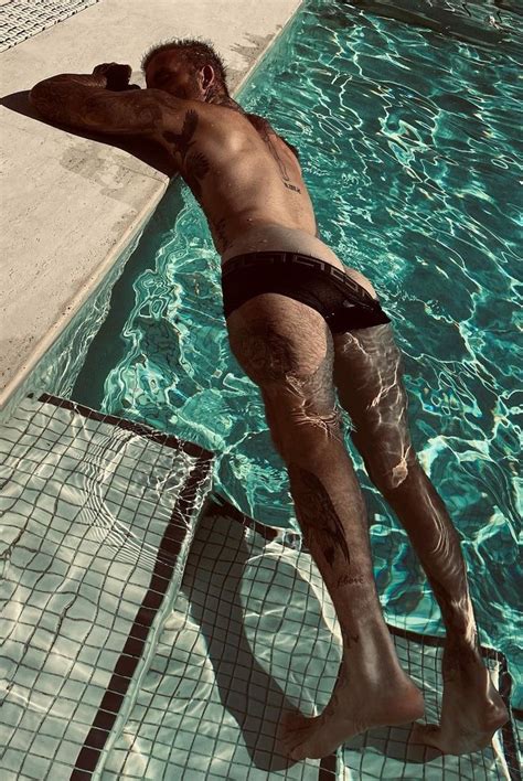David Beckham Flashes His Naked Bum As He Relaxes In The Pool In Cheeky