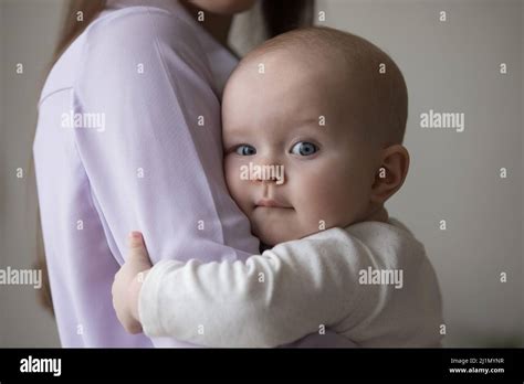 Young Woman Cuddling Sweet Adorable Newborn Baby Stock Photo Alamy