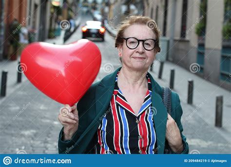 Mature Urban Elegant Woman Celebrating Valentines Day Stock Image