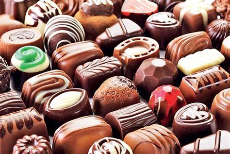 A chocolate bar (british english) or candy bar (american english) is a confection in an oblong or rectangular form containing chocolate, which may also contain layerings or mixtures that include nuts, fruit, caramel, nougat, and wafers. All About Gourmet Chocolate: Types, Flavors, Brands of ...