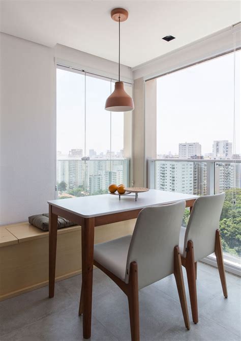 Table made of veneers, wood and engineered wood. This Small Apartment In Brazil Has A Bedroom Hidden Behind ...