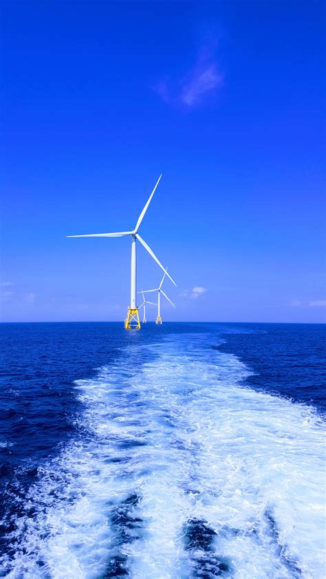 Download Energy Windmills Floating On Sea Wallpaper