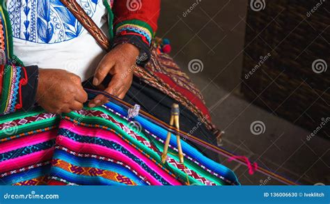 Close Up Of Weaving In Peru Cusco Peru Woman Dressed In Colorful
