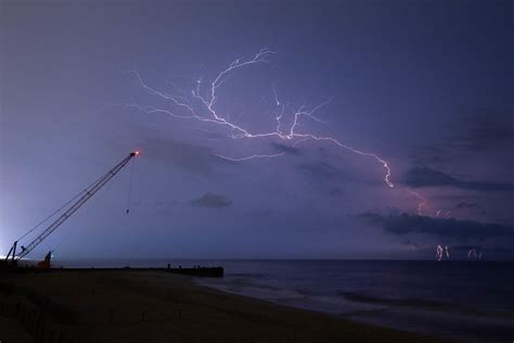 Electrifying A Lightning Storm Seen From The Beach In Bay Flickr