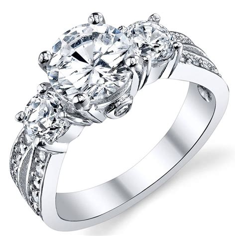 The best cz engagement rings are typically set in 14k, 18k and white gold. Oliveti Round Cubic Zirconia " Past, Present, Future" Sterling Silver Wedding Engagement Ring ...
