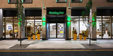 The hotel offers spacious rooms, a modern bar and lounge. Holiday Inn - About Manchester