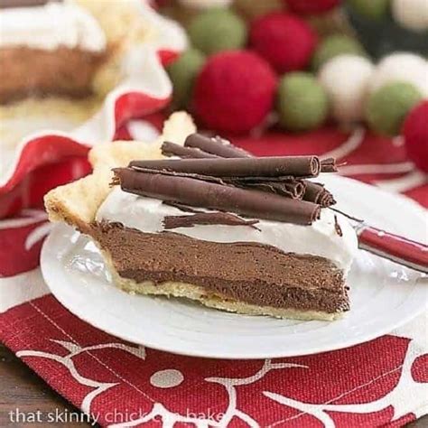 Serve mousse with strawberries and cookies for dipping. Black Bottom Chocolate Mousse Pie | That Skinny Chick Can Bake
