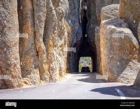Car In Needles Eye Tunnel On The Needles Highway In Custer State Park
