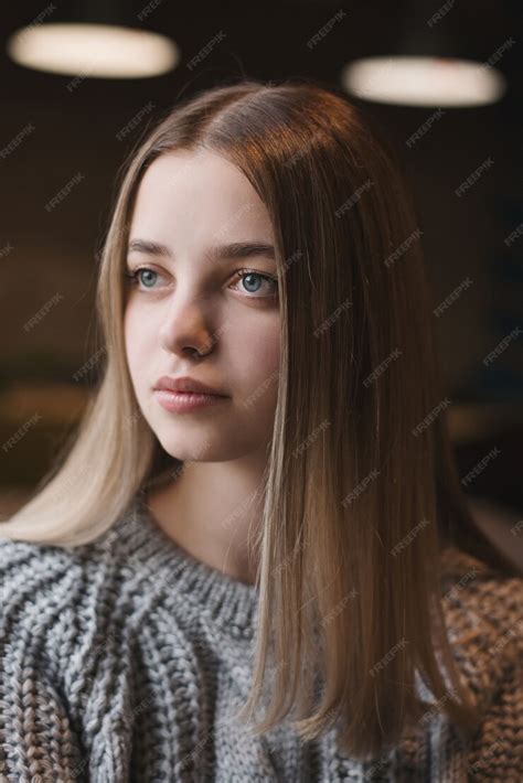 Premium Photo Portrait Of A Teenage Girl With Blond Hair And Blue Eyes