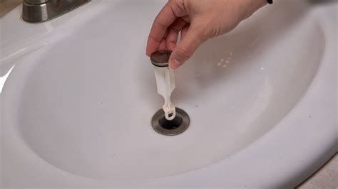 How To Remove A Sink Stopper Clogged Sink Bathroom Bathroom Sink Diy