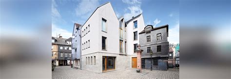 franken architekten engraves ghost timbers into facade of frankfurt house niddastraße 84