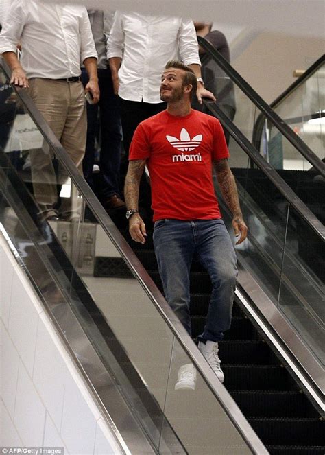 David Beckham Is Mobbed By Fans As He Jets To Dubai To Open New Store