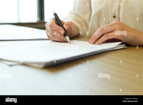 Person Signing Paperwork Stock Photo Alamy
