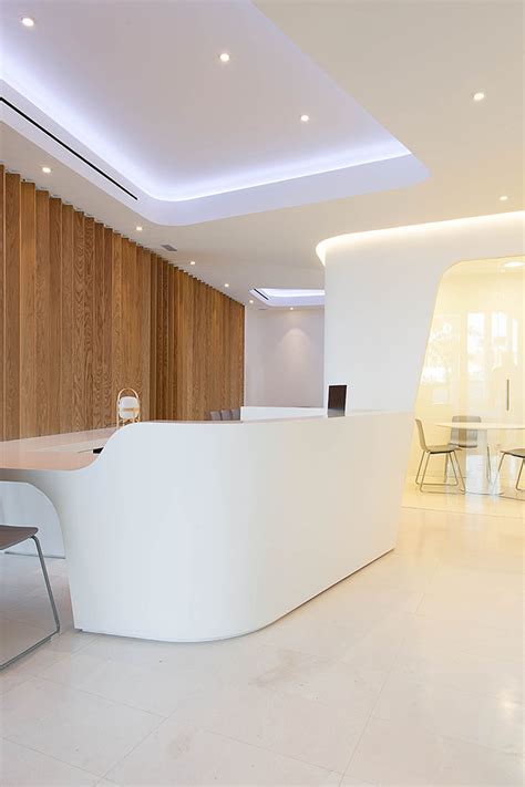 Located in a busy street of sant boi de. Acevedo Dental Office by YLAB Arquitectos - Archiscene