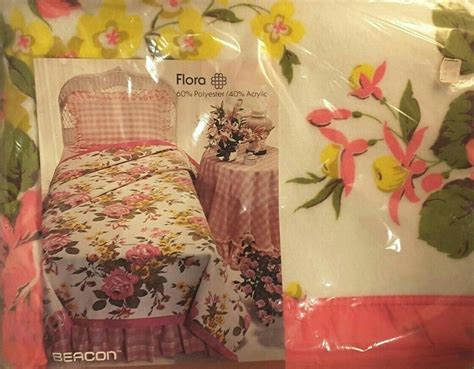 With a stylish pattern of pink flamingoes this wrapping paper will add the finishing touches to a special gift.110 gms. Vintage Beacon 'Flora' pattern printed blanket. 60% ...