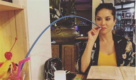 Sunny Leone Looks Super Hot As She Slurps Her Hubby Daniel Webers Drink With A Long Curve Straw