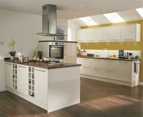 Nov 23, 2017 · our kitchen is the howdens fairford range in cashmere, with solid oak block 40mm worktops. Greenwich Gloss Ivory Kitchen | Universal Kitchens ...