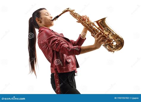 Female Saxophonist In A Red Leather Jacket Playing A Sax Stock Photo