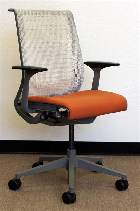It's smart enough to understand how you sit. Steelcase Think Used Task Chair, Orange | National Office ...