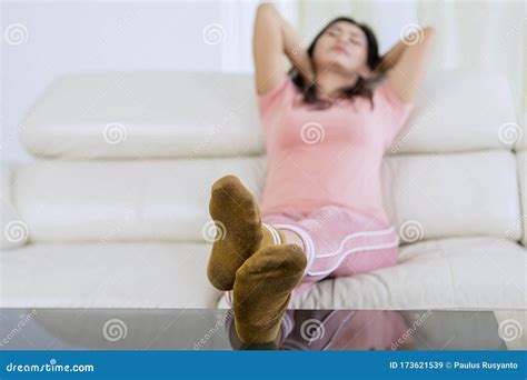 Pretty Sleeping Woman On A Couch Feet With Socks Stock Image Image Of