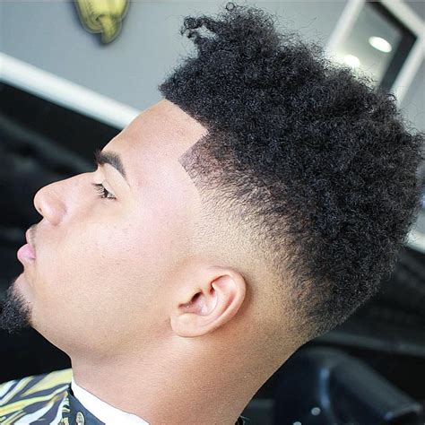 The popularity of this mens haircut fade lies in its clean look, and with gradual fading on the sides and back, this hairstyle adds an element to your style. nice 90 Creative Taper Fade Afro Haircuts - Keep it Simple ...