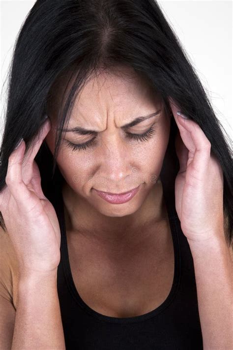 Woman Holding Her Head In Her Hands Stock Photo Image Of Indoors