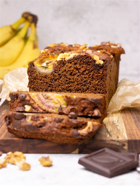 Slice your third banana in half and press each half into the top of your bread batter, so it is flush with the rest of your bread. The Perfect Vegan Banana Bread - The Veggienator