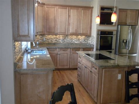 What is the average cost of refacing cabinets versus replacing cabinets? Cabinet Refacing St. Louis | Kitchen Cabinet Refinishing Company