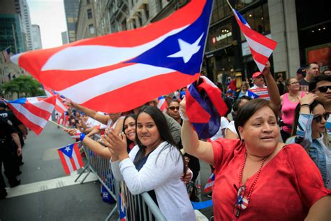 Puerto Rican Day Parade Participants Celebrate And Mourn