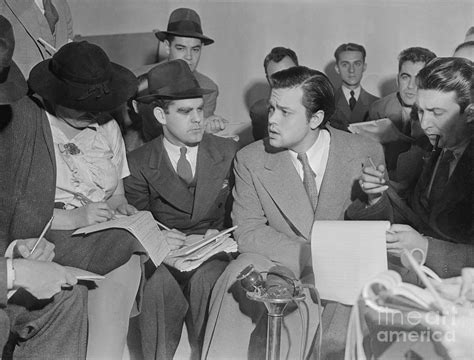 Orson Welles Explaining Radio Broadcast By Bettmann
