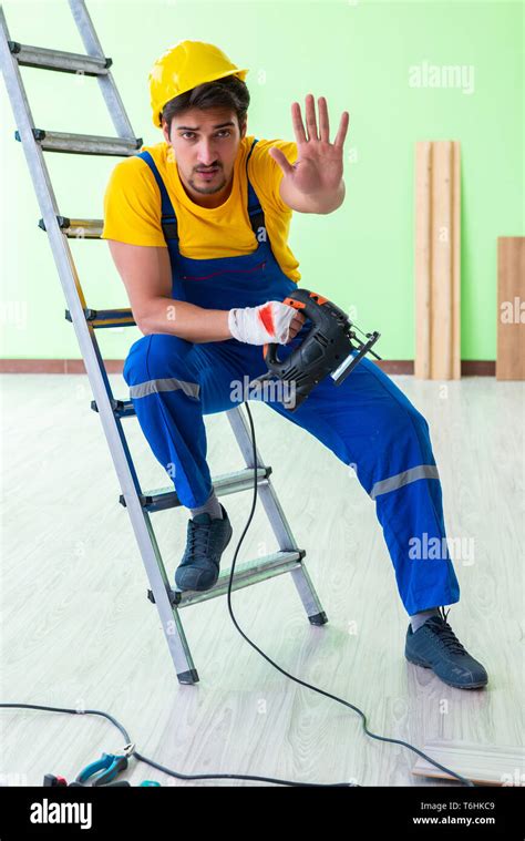 Injured Worker At The Work Site Stock Photo Alamy